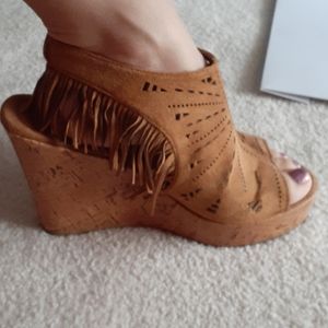 Cute tan fringe wedges